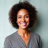 Dr. Sarah Mitchell, a confident woman in a professional setting